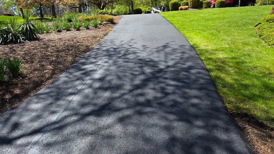 Long residential asphalt driveway paved in Morris County, New Jersey