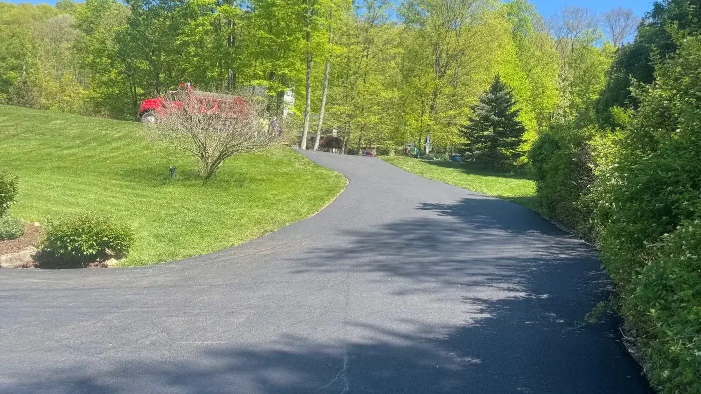 Private asphalt road running through wooded property in New Jersey