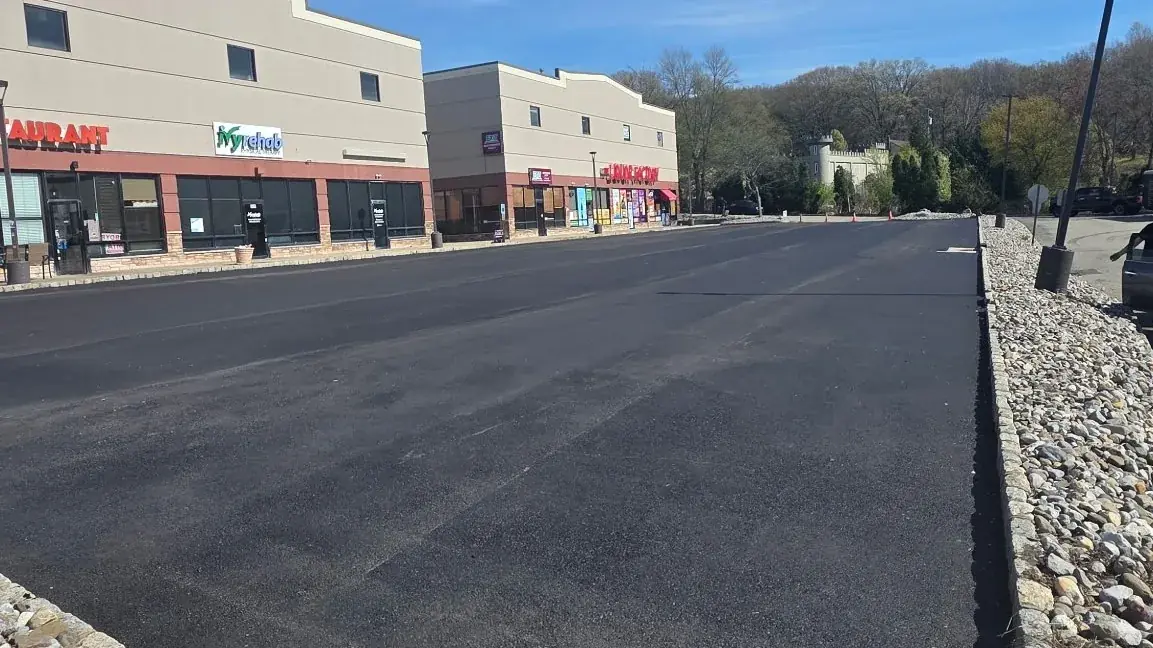 Striped retail parking lot paved and marked in New Jersey