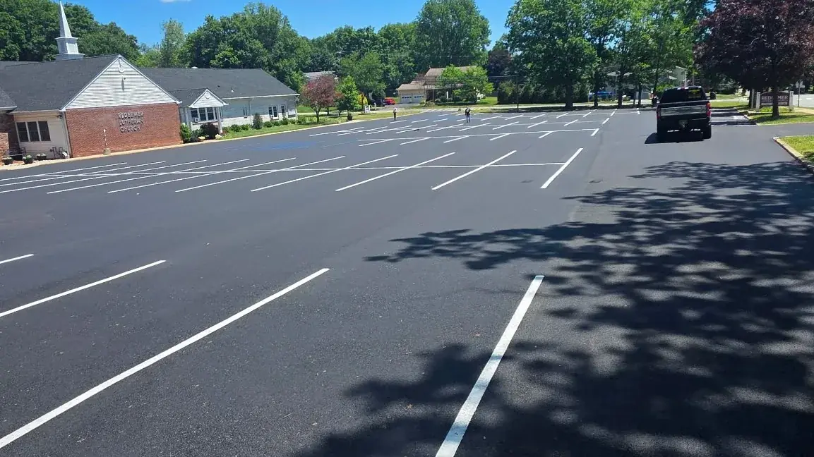 Freshly striped parking lot with crisp white stalls